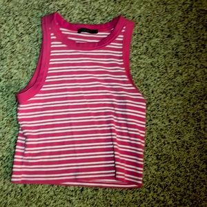 This top is from Forever 21. It fits a little cropped. Its only been warn twice.